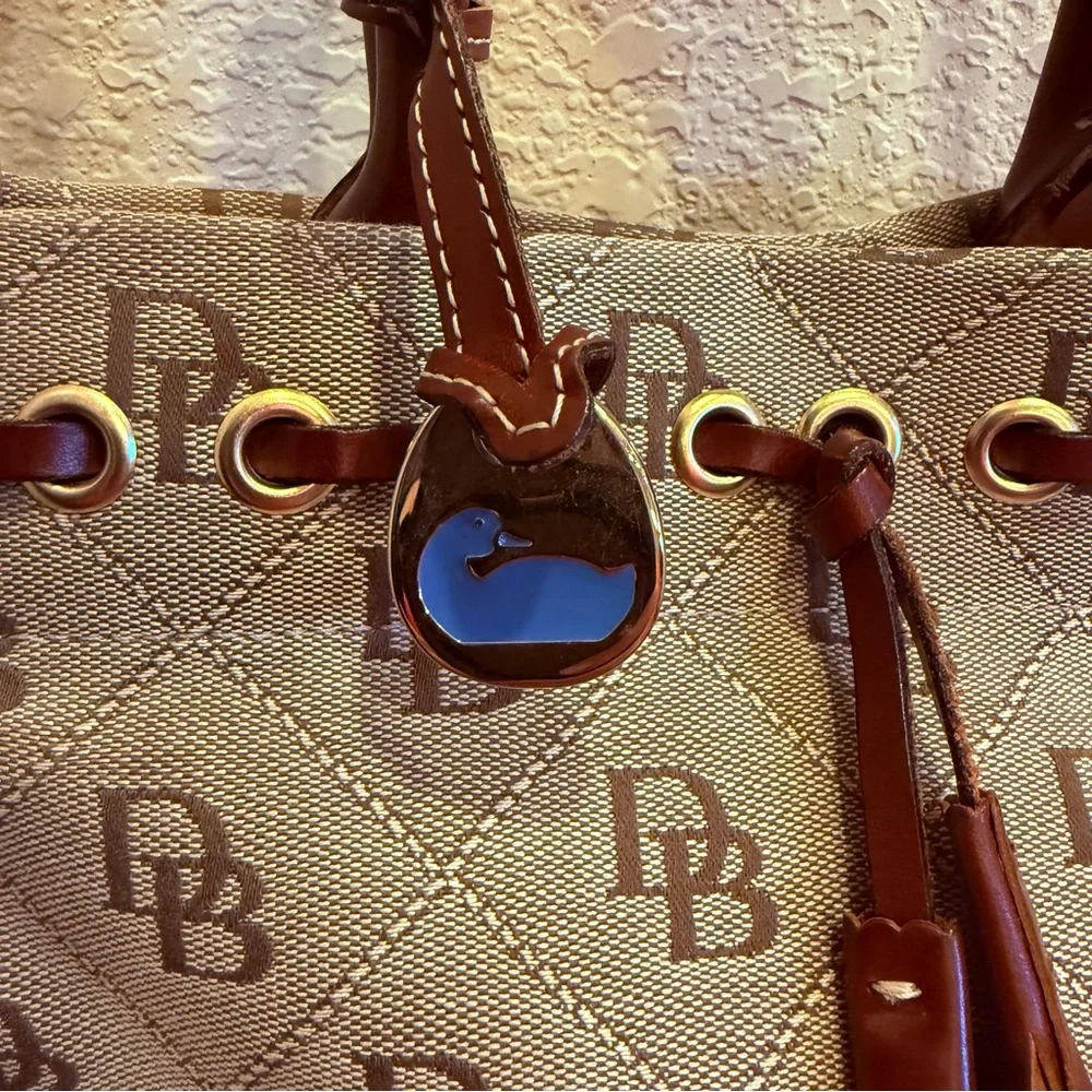 Dooney & Bourke Women’s Tan and Brown Signature Logo Canvas and Leather Bag
